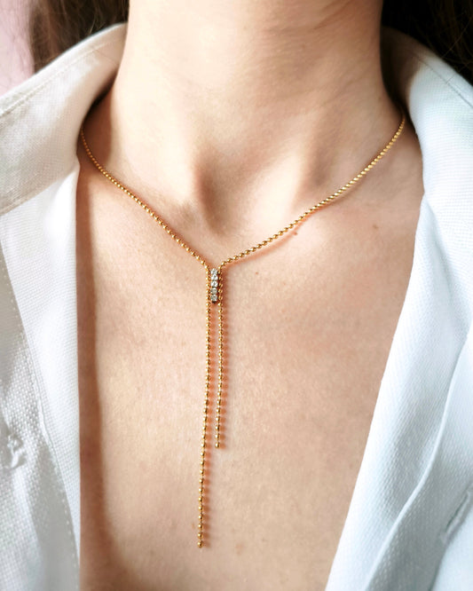 Etincelle - collier à billes et 5 zirconium porté