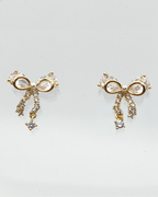 Grâce - boucles d'oreilles nœuds présentation dorées