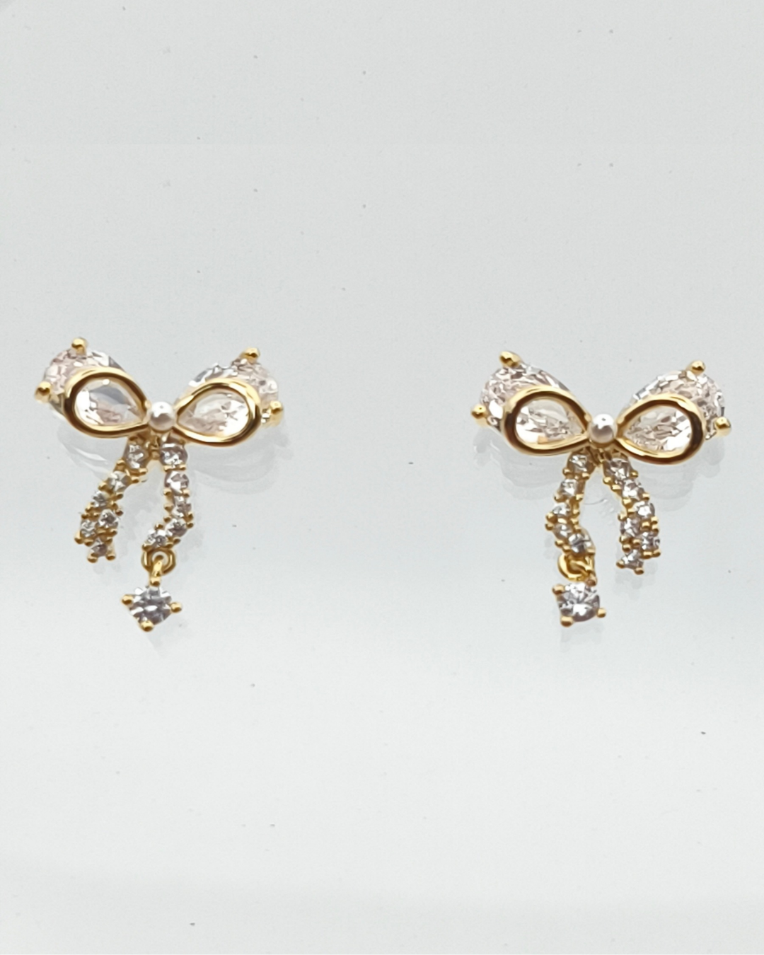 Grâce - boucles d'oreilles nœuds présentation dorées