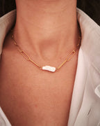 Prestance - collier trombone grosse perle porte