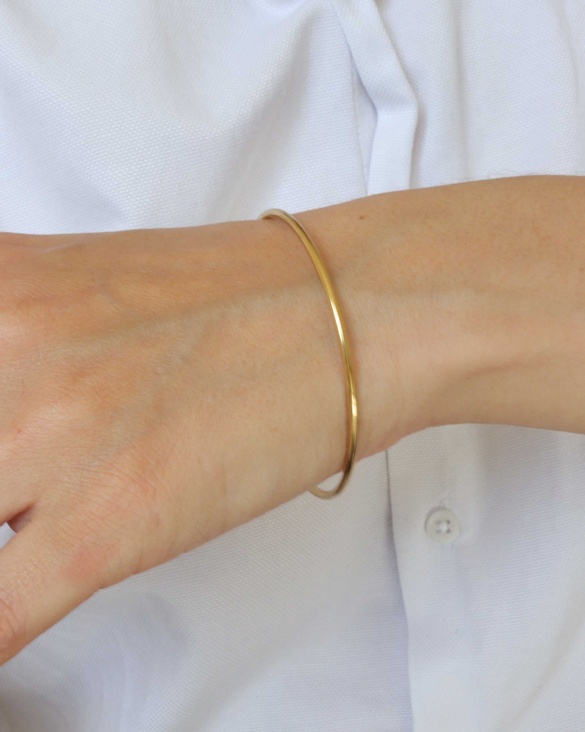 Triomphe bracelet jonc rond porté