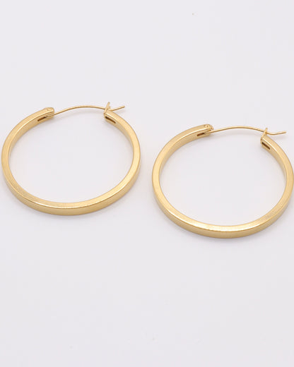Photo des boucles d'oreilles créoles plates diamètre 32mm
