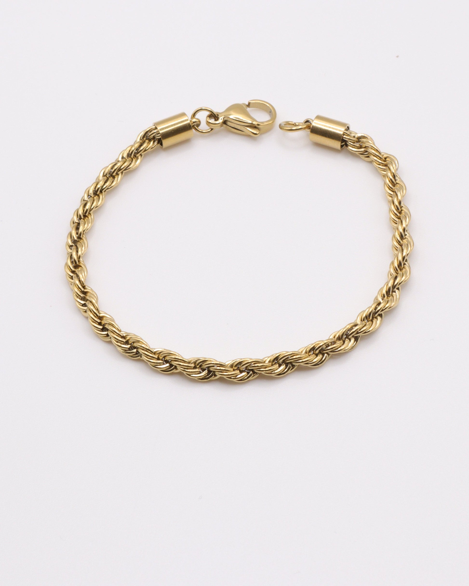 photo du bracelet corde en doré à l'or 750/1000ème (18 carats) sur fond gris clair