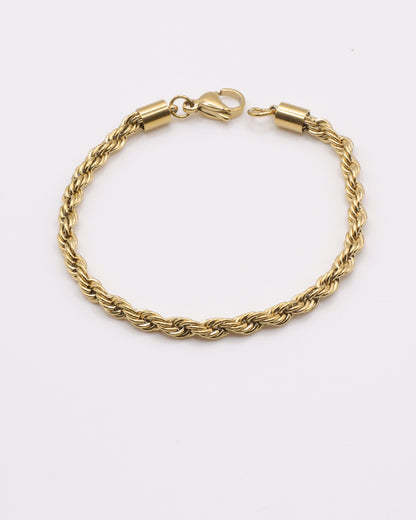 photo du bracelet corde en doré à l'or 750/1000ème (18 carats) sur fond gris clair