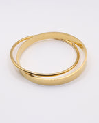 photo du bracelet jonc rond et plat en doré à l'or 750/1000ème (18 carats) sur fond gris clair