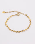 Photo du bracelet rond à maille soleil en acier inoxydable doré à l'or 750/1000ème (18 carats) sur fond blanc